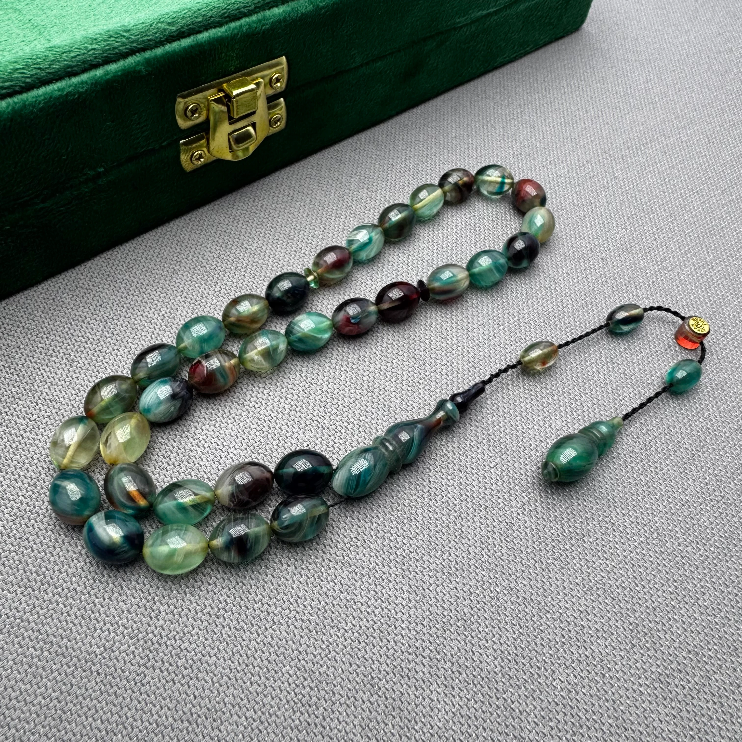 Ayhan TURAN Usta İşçilikli Hareli Renk Süzmeli Beyzi Kesim Ateş Kehribar Tespih